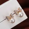Nuevos Pendientes de Perla con Lazo Chapados en Oro Estilo Europeo y Americano para Mujer Moda Elegante Pendientes de Diamante Joyería