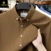 Camisa de algodón puro para hombre de primavera y otoño, moderna camisa casual de pana de manga larga con bolsillos para hombres jóvenes y de mediana edad, hecha a medida por el fabricante