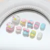 Macarrón de colores gato de dibujos animados flor lazo corazón dulce y juguetón uñas postizas manicura infantil uñas ponibles