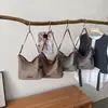 Diseño de Nicho Versátil Transfronterizo Verano 2026 Nuevo Exquisito Moda para Viajes Diarios Bolso Tote de Hombro Cruzado de Alta Gama