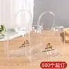 Bolsa de mão transparente de PVC de fábrica, acessórios de cosméticos, bolsa de armazenamento de brinquedos para beira-mar, bolsa de PVC estéreo com logotipo estampado
