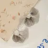 [Luz Flotante y Dorada] Otoño e Invierno Nuevo Nuevo Estilo Chino Hueco Hoja de Ginkgo Borla Repelente de Mosquitos Disco Clip de Oreja Pendientes de Atmósfera