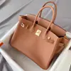 Bolsa Platina Pele de Bezerro Padrão Lichia 2026 Nova Fechadura Grande Capacidade Bolsa de Mão Bolsa Kelly Bolsa de Ombro Único Transversal