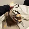 Bolso tote casual y sencillo para mujer, nuevo estilo 2026, diseño retro, gran capacidad, adecuado para ir al trabajo