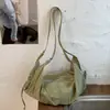 Bolsa Feminina Nova Primavera 2026 Design de Nicho com Textura de Alto Padrão Transfronteiriça Simples de Ombro Sob o Braço Transversal Bolsa Bolinho