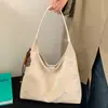 Bolsa de camurça transfronteiriça de comércio exterior para mulheres, grande capacidade, nova temporada 2026, bolsa de ombro sob o braço vintage, bolsa de compras para o dia a dia
