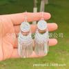 Aretes de cesta de flores de estilo étnico al por mayor aretes de filigrana aretes de linterna de filigrana largos suministro de lugares escénicos