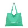 Bolsa de Lona Artística Estilo Coreano 2025 Nova Bolsa de Ombro de Lona Casual Estampada com Letras Grande Capacidade Bolsa Tote Estudante