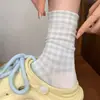 Calcetines de algodón puro para mujer de otoño e invierno, con diseño de lazo, calcetines versátiles de estilo japonés hasta la pantorrilla, perfectos para combinar con tenis, y calcetines con volantes de estilo coreano