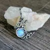 Deseo collar de luna de piedra lunar europeo y americano transfronterizo personalidad temperamento retro femenino colgante hueco regalo venta al por mayor