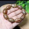 Xizang envolvido Polpa pulseira masculina Tianzhu à primeira vista para bênção familiar Nove Olhos pulseira Tianzhu preto e branco Duobao Tianzhu