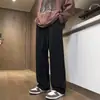 Pantalones casuales retro americanos para hombre estilo otoño e invierno con felpa interior color albaricoque pantalones deportivos marca de moda sueltos de caída pantalones de pierna ancha