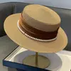 Elegante Sombrero de Copa Plana Estilo Francés 2026 Nuevo Sombrero de Sol Elegante de Paja con Perlas de Verano para Mujer