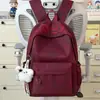 Mochila de color sólido con degradado y letras, simple y versátil, para estudiantes de secundaria y preparatoria, ligera, simple, elegante y de gran capacidad