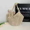 Bolso de hombro tejido para mujer, nuevo bolso tote de paja calado primavera/verano, bolsa de playa de gran capacidad para vacaciones, bolso de ganchillo hecho a mano