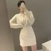 Saia de couro marrom, novo estilo outono/inverno 2026, saia bodycon de PU elástico, cintura alta, saia curta super popular, preta, vestuário de outono feminino