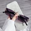 Gafas de sol sin marco de metal para mujer, venta al por mayor transfronteriza, muy populares en AliExpress.