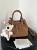 Yuezhi 2026 Verano Nuevo Versátil de Moda Texturizado Pequeño Bolso de Diseño Bolso Cruzado Versión Coreana de Mano Plegado Bolso Cubo