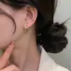 Pendientes de Diseño Exclusivo de Alta Gama Chapados en Oro con Microincrustaciones y Nudo Dorado de Pedrería para Mujer, Pendientes de Lujo Ligero de Celebridad de Internet Coreana