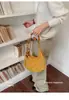 Bolso grande de mujer 2026 nuevo bolso tote de moda para el día a día bolso de hombro de gran capacidad bolso bandolera tipo cubo
