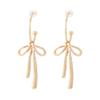 Pendientes colgantes de lazo sencillos y dulces de estilo coreano para mujer, ligeros, lujosos, de alta gama, con un estilo distintivo y combinables.