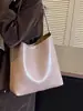 Yaozi 2026 colección de principios de otoño: un bolso cubo de gran capacidad, moderno y versátil, perfecto para ir al trabajo y con un diseño retro