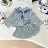 Traje de tweed estilo francés para niña 2026 otoño nueva moda chaqueta con flecos y falda plisada conjunto de dos piezas