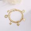 Explosiones Transfronterizas Pulsera de Hilo con Borla de Trébol de Cuatro Hojas Doradas para Mujer Moda Japonesa y Coreana Pulsera de Flor Prismatic