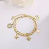 Pulseira de Franja Personalizada Dourada Oca Trevo de Quatro Folhas Transfronteiriça para Mulheres, Pulseira de Flor Prismática da Moda Japonesa e Coreana que Não Desbota