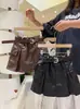 Falda Corta Rantuo para Niñas Modelo Nuevo 2026 Falda Infantil de Cuero PU Estilo Moderno Fresco para Niños Mayores Falda Corta Venta al por Mayor Transfronteriza