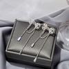 Pendientes de Borla de Diamante Super Flash Aguja de Plata Celebridad de Internet Lujo Ligero Diamante Completo Letra Ojo de Gato Zorro Pendientes Largos Dos Pendientes