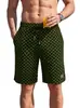 TK Pantalones Cortos de Jacquard Espiga Europeos para Hombre con Parche de Cuero Casual Deportivo Holgados Transpirables Elásticos de Cinco Puntos