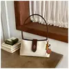 Bolso de mano con textura de nicho para mujer 2026 nuevo bolso tipo cubo simple para el día a día, de viaje, moderno, versátil, bolso cruzado para mujer