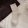 Meias com etiqueta de tecido de bolinhas estilo Miu para mulheres, meias de cano médio, primavera e outono, color block retrô francês, Maillard, sem costura, meias largas (slouch socks)