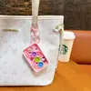 Llavero Creativo de Dibujos Animados con Figura Pequeña y Placa de Engranajes Divertida Descompresión Juguete para Estudiantes Colgante Máquina de Garra Pequeños Regalos al por Mayor