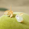 Elegante imitación de jade Hetian natural, anillo de conejo, colgante, collar, aretes de botón, juego de joyas, oro antiguo, lindos aretes de botón de conejo