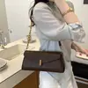 Bolsa feminina 2026 novo modelo, bolsa baguette retrô de corrente de nicho de luxo leve, bolsa de ombro crossbody de axila de alta qualidade para o dia a dia