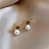 Pendientes de Reloj de Bolsillo Asimétricos con Incrustaciones de Perla de Aguja Plateada y Diamante Pendientes de Botón Exquisitos Retro Franceses con Sentido de Diseño Pendientes de Nicho Venta al por Mayor