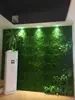 Fundo de parede de parede de planta artificial, combinação de plantas verdes biomiméticas e flores artificiais, gramado artificial para criar paisagem, decoração interna e externa.