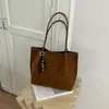 Bolsa tote casual de grande capacidade, cor sólida, nova versão coreana outono 2026, bolsa de mão e bolsa de ombro personalizadas para trabalho e deslocamento