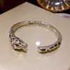 Pulsera Abierta de Leopardo con Circonita Galvanizada en Oro Real de 18K Pulsera de Moda Transfronteriza Europea y Americana Lujo Accesible Joyería de Alta Gama para Mujeres