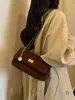 Moda Otoño 2026 Nuevo Bolso de Axila Bolso de Cadena Cuadros de Terciopelo Retro Bolso de Hombro Único Diario de Mano Cruzado Bolso para Mujer