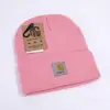 En Stock Tela Acrílica de Comercio Exterior Etiqueta Gorro de Punto Moda Beanie Borde Enrollado Cálido Lana para Esquí Gorro Beanie Color Sólido Holgado