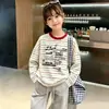 Camiseta a rayas elegante de manga larga para niñas, nueva moda de primavera y otoño, camiseta básica de cuello redondo estilo coreano para niños mayores