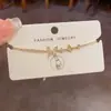 Pulseras de hilo con mariposa de circonita cúbica, exquisitas y a la moda, de estilo japonés y coreano, que exudan un ambiente elegante, lujoso y versátil, con un aspecto de alta gama y deslumbrante - disponibles al por mayor