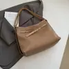 2026 Bolsa de Couro Listrada Simples de Grande Capacidade para o Dia a Dia Bolsa de Ombro Versátil Bolsa Tote de Grande Capacidade Transfronteiriça