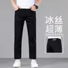 Jeans cropped negros de seda helada que no se decoloran para hombre, verano 2026, pantalones casuales rectos elásticos finos de corte ajustado