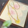 Joyería de oro Jin Yan con oro de arena giratorio marca flor koi candado de la paz doble gancho colgante accesorios DIY cadena clavicular