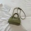 Bolso pequeño elegante y atractivo estilo coreano modelo nuevo 2026 bolso de mano de color liso bolso cruzado con patrón tejido bolso de mano exquisito