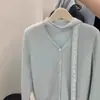 Top de Punto para Mujer Coreano de Manga Larga Azul con Cuello en V, Sentido del Diseño, Encaje Fluyente, Estilo Occidental para Mujeres Pequeñas, Otoño e Invierno 2024